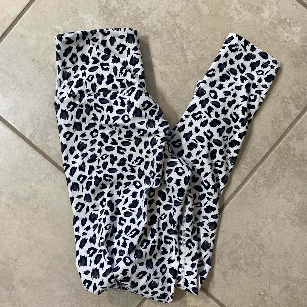 Ryderwear Snow Leopard size small